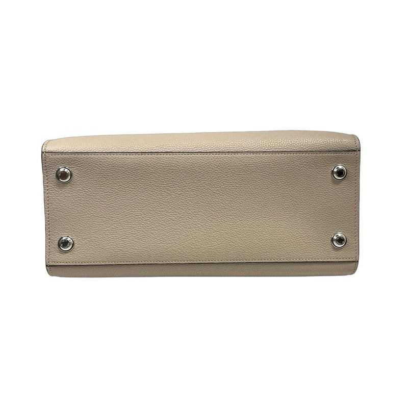Louis Vuitton "Taurillon MM City Steamer Leather" Bag
